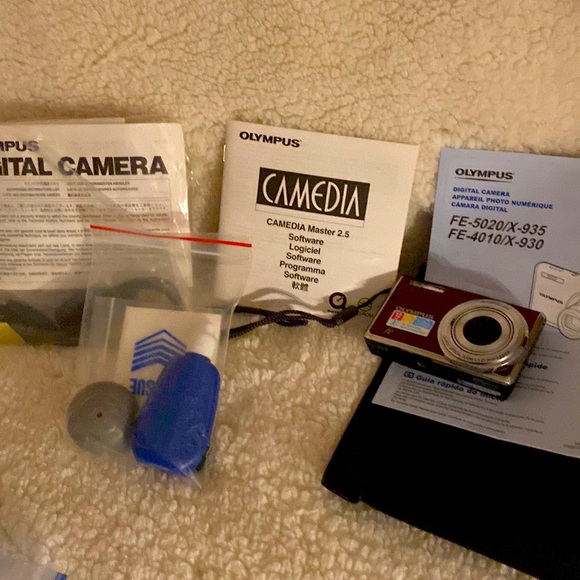 Gifted.  Olympus Digital Camera with all that came with it. Original cost $150. - Picture 2 of 9